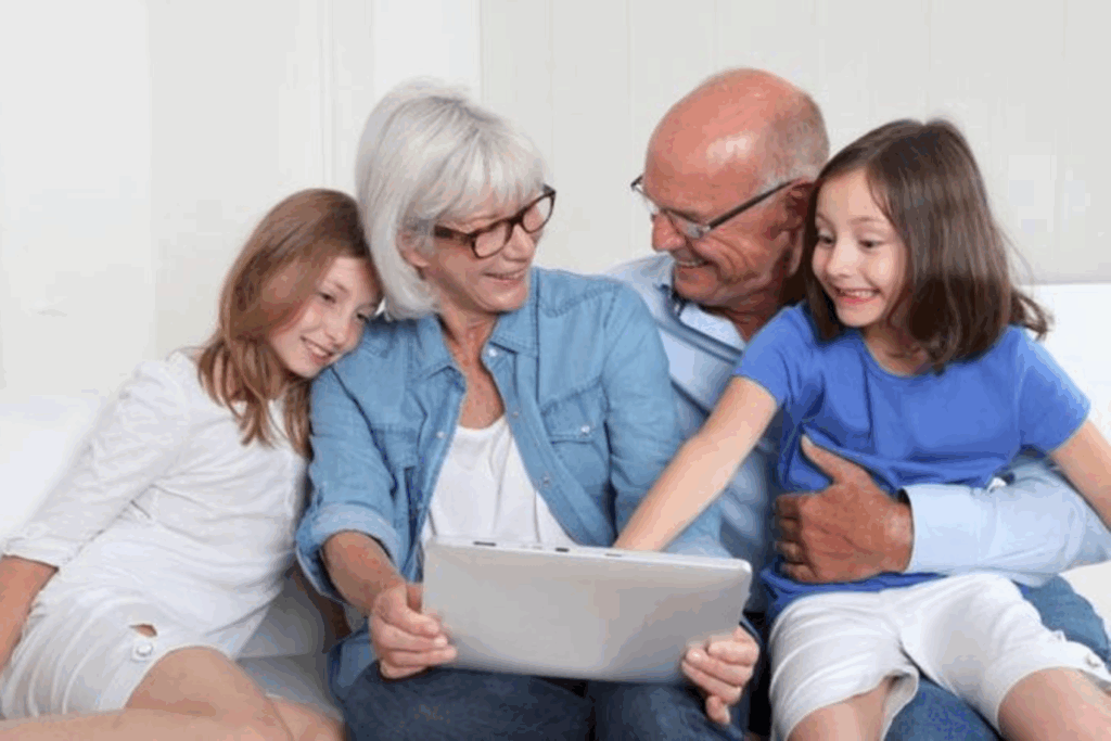 Familia de varias generaciones compartiendo un momento de conexión emocional, representando cómo los vínculos influyen en la expresión genética según la epigenética.